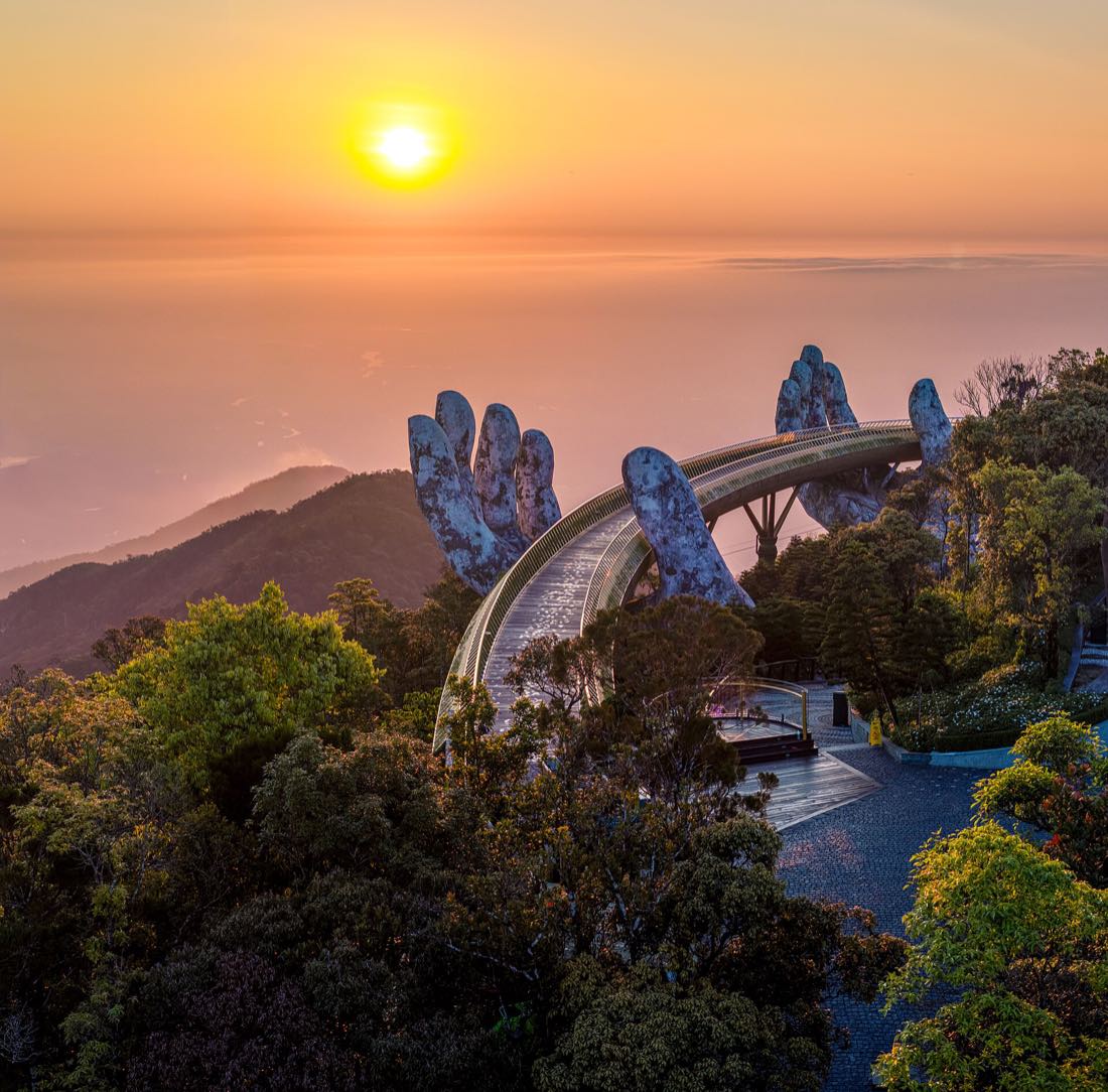 The Golden Bridge held up by two giant stone hands at Ba Na Hills